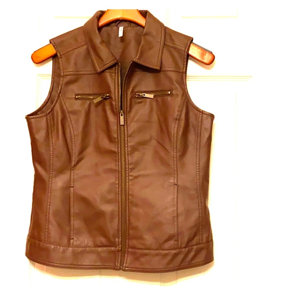 Water proof, weather resistant zip up vest
